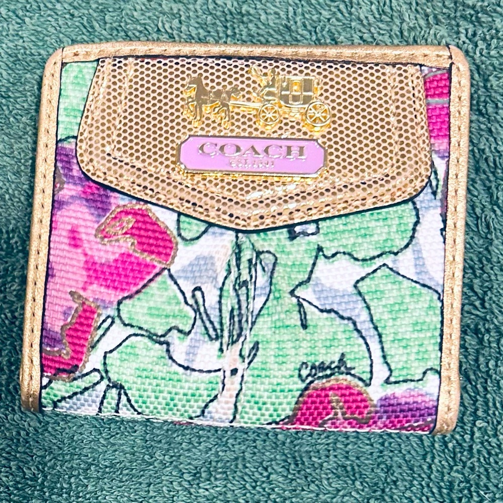 Coach Ashley Floral Iris compact wallet in great condition.